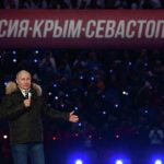 Президент РФ Владимир Путин на концерте в Лужниках в честь воссоединения Крыма и России