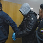 Арестованный под конвоем